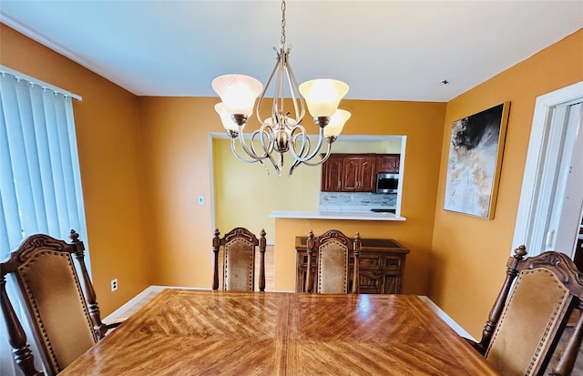 unfurnished dining area with a notable chandelier