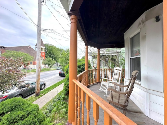 wooden deck featuring a porch