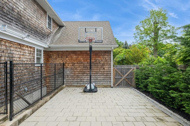 8 Hilltop Dr, Bayville, NY 11709 - view of patio featuring fence and a gate