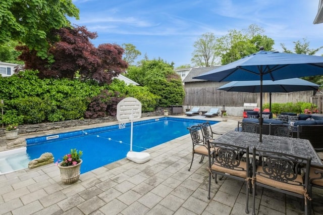 8 Hilltop Dr, Bayville, NY 11709 - view of pool featuring a fenced in pool, a patio, fence, and outdoor dining space
