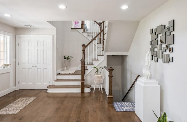 8 Hilltop Dr, Bayville, NY 11709 - entrance foyer featuring recessed lighting, stairway, baseboards, and wood finished floors