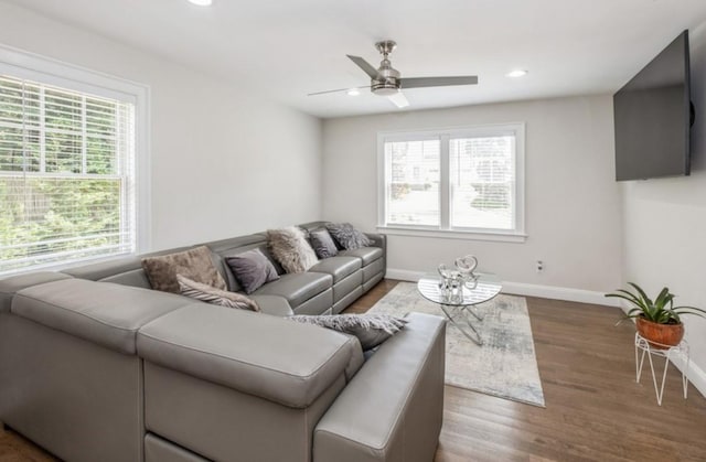 8 Hilltop Dr, Bayville, NY 11709 - living area with a healthy amount of sunlight, ceiling fan, and baseboards