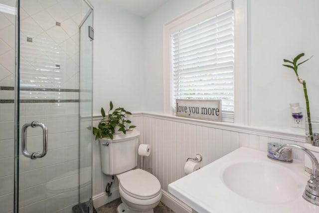 8 Hilltop Dr, Bayville, NY 11709 - full bath featuring a shower stall, wainscoting, a sink, and toilet