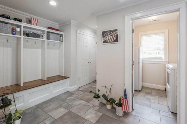 8 Hilltop Dr, Bayville, NY 11709 - mudroom featuring baseboards, recessed lighting, crown molding, washer / dryer, and visible vents