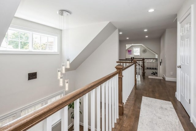 8 Hilltop Dr, Bayville, NY 11709 - hallway with dark wood-style flooring, an upstairs landing, and recessed lighting