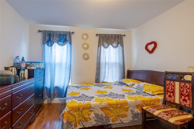 97-14 88th St, Ozone Park, NY 11416 - bedroom with wood-type flooring and multiple windows