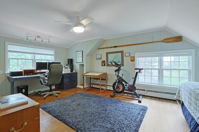 12 Heath Rd, Valhalla, NY 10595 - home office with vaulted ceiling, a ceiling fan, wood finished floors, and crown molding