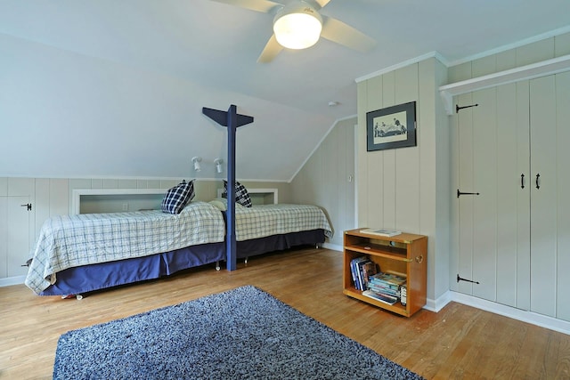 12 Heath Rd, Valhalla, NY 10595 - bedroom with wood finished floors, baseboards, a ceiling fan, lofted ceiling, and ornamental molding