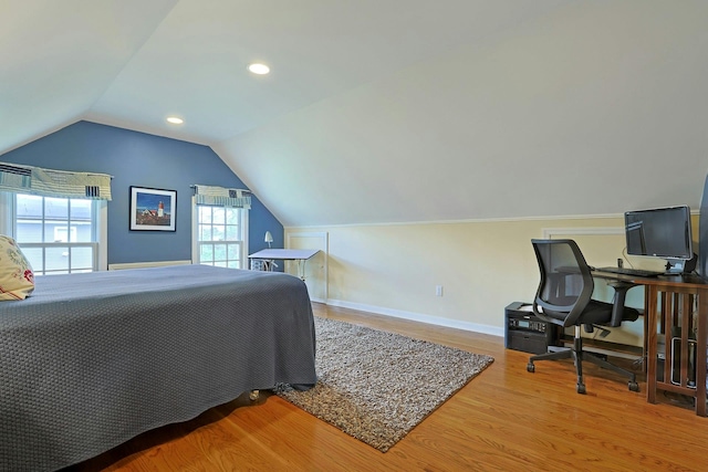 12 Heath Rd, Valhalla, NY 10595 - bedroom featuring wood finished floors, vaulted ceiling, baseboards, an office area, and recessed lighting
