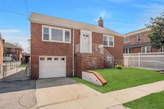 bungalow-style house with a chimney, concrete driveway, an attached garage, brick siding, and a front yard