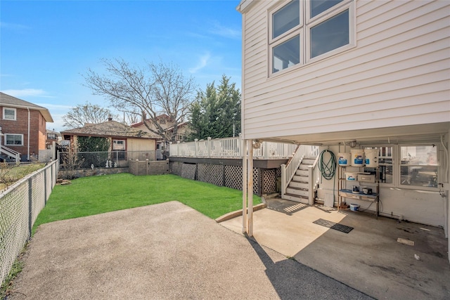view of patio / terrace featuring stairs, a fenced backyard, and a deck