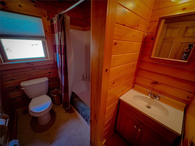 full bath featuring wood walls, toilet, vanity, and shower / bath combination with curtain