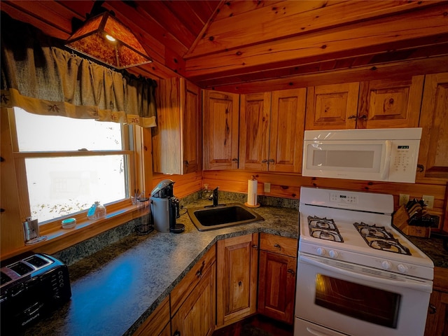 607 Baker Hill Rd, Roscoe, NY 12776 - kitchen featuring white appliances, brown cabinets, and dark countertops