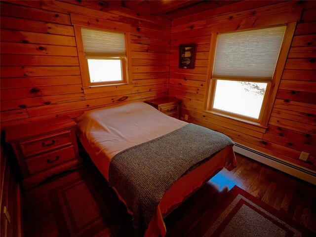 607 Baker Hill Rd, Roscoe, NY 12776 - bedroom featuring a baseboard radiator, wood walls, and wood finished floors