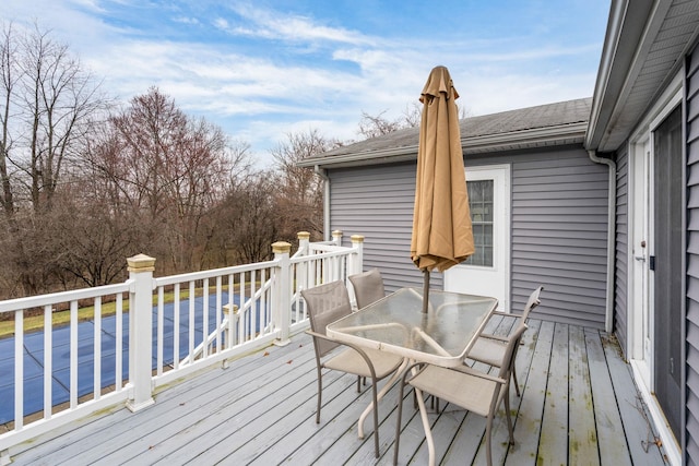 deck featuring outdoor dining space