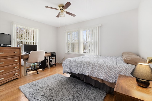 bedroom featuring ceiling fan and light wood-style floors