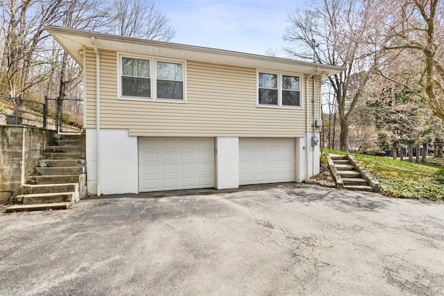 exterior space with aphalt driveway