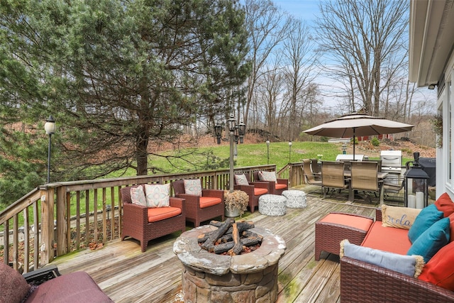 13 Cross Rd, Cortlandt Manor, NY 10567 - wooden terrace featuring an outdoor living space with a fire pit and outdoor dining area