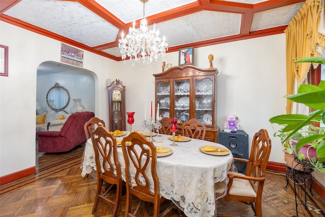 3518 Clarendon Rd, Brooklyn, NY 11203 - dining space featuring arched walkways, an inviting chandelier, and baseboards