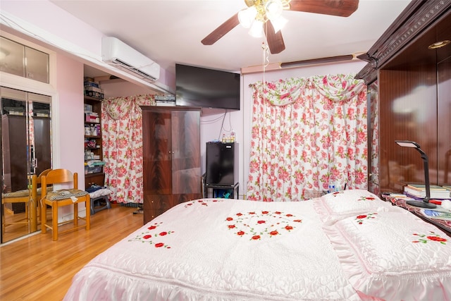 3518 Clarendon Rd, Brooklyn, NY 11203 - bedroom featuring a ceiling fan, wood finished floors, and a wall mounted air conditioner