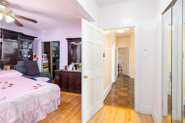3518 Clarendon Rd, Brooklyn, NY 11203 - bedroom with baseboards, a ceiling fan, and wood finished floors