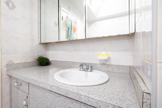 3518 Clarendon Rd, Brooklyn, NY 11203 - bathroom featuring vanity and backsplash