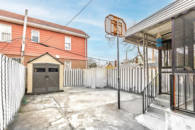 3518 Clarendon Rd, Brooklyn, NY 11203 - view of patio / terrace featuring an outdoor structure, a shed, and a fenced backyard