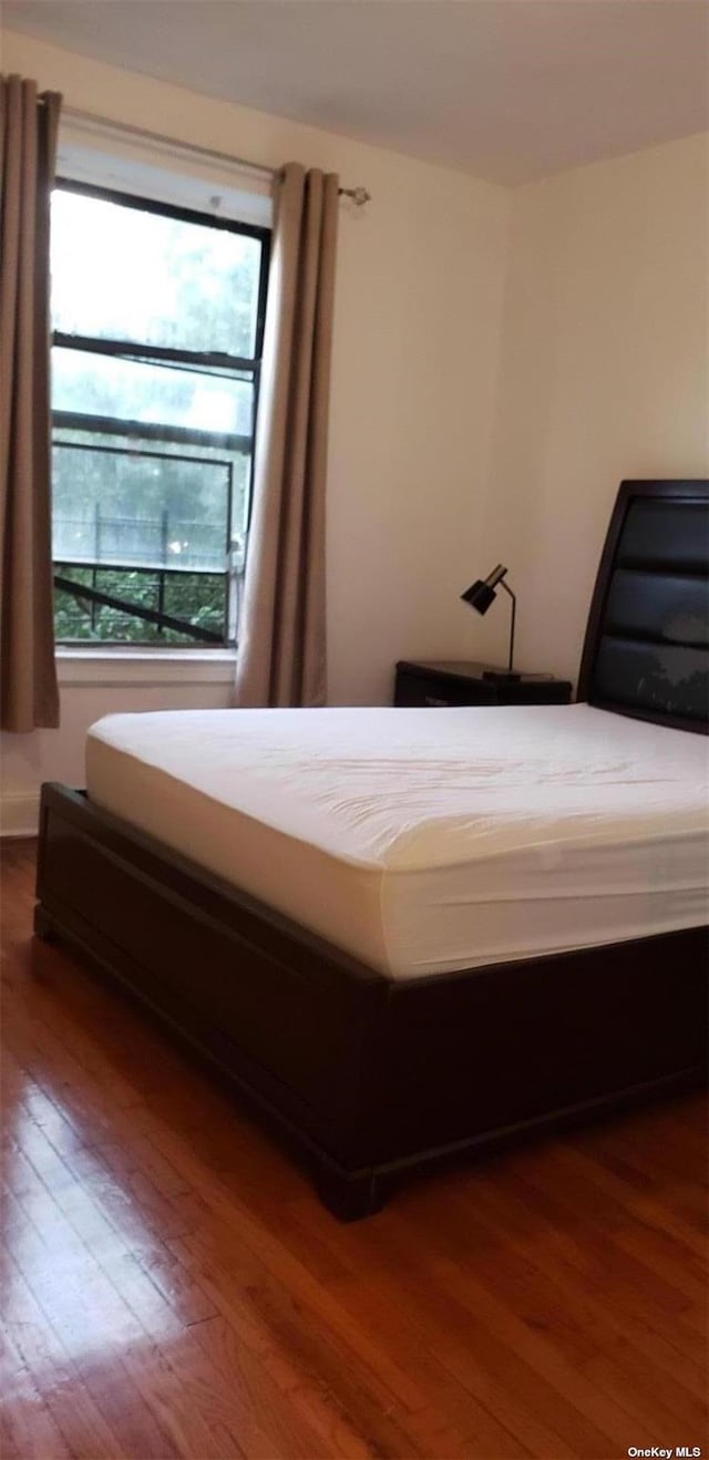 44-15 43rd Ave Unit 5N, Sunnyside, NY 11104 - bedroom with wood finished floors