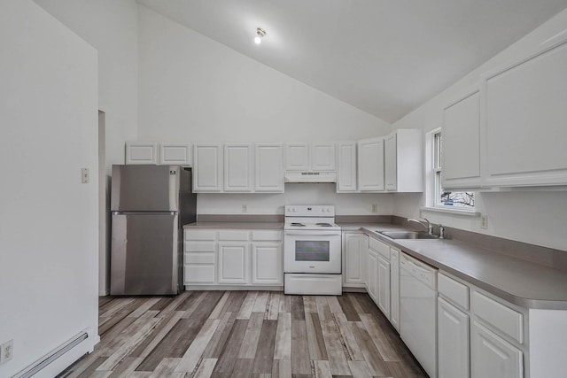 kitchen featuring high vaulted ceiling, white appliances, under cabinet range hood, a sink, and a baseboard radiator