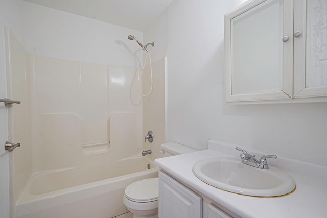 full bathroom with toilet, vanity, and shower / washtub combination