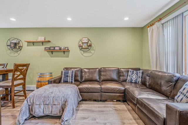 575 Bayport Ave, Bayport, NY 11705 - living room with wood finished floors, recessed lighting, and a baseboard radiator