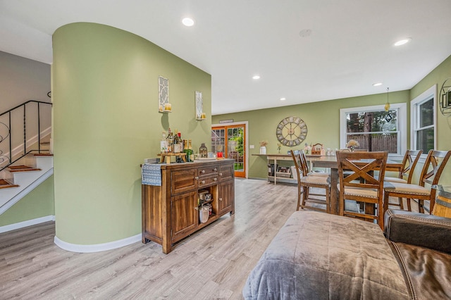 575 Bayport Ave, Bayport, NY 11705 - living area featuring light wood finished floors, stairs, plenty of natural light, and recessed lighting