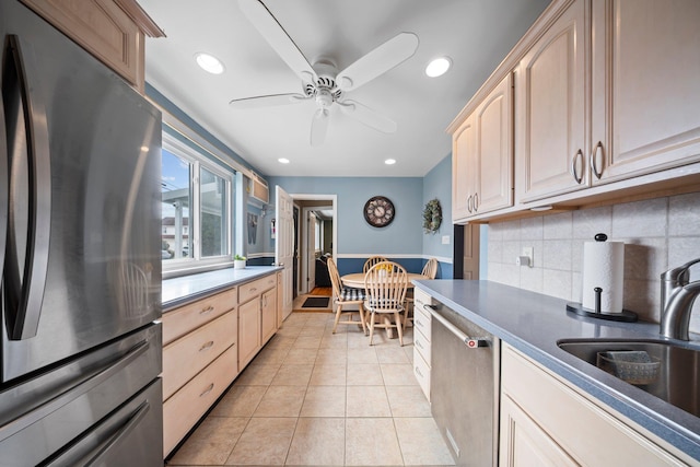 2 Lee Ave, Albertson, NY 11507 - kitchen featuring appliances with stainless steel finishes, decorative backsplash, light brown cabinets, and a ceiling fan