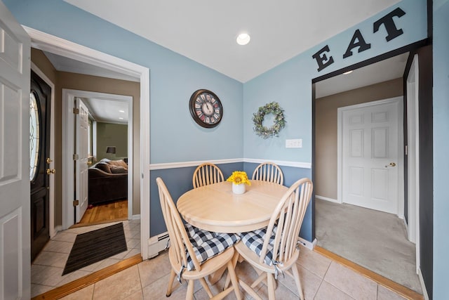 2 Lee Ave, Albertson, NY 11507 - dining space with light tile patterned floors, baseboards, and a baseboard radiator