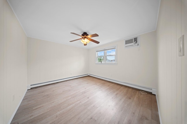 2 Lee Ave, Albertson, NY 11507 - spare room with baseboard heating, a wall unit AC, wood finished floors, and ceiling fan