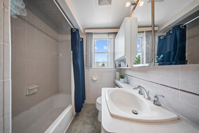 2 Lee Ave, Albertson, NY 11507 - bathroom featuring a sink, tile walls, toilet, and shower / bathtub combination with curtain