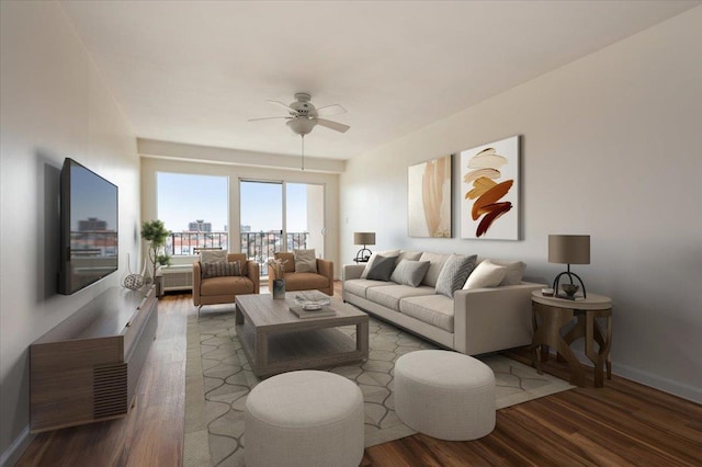 living room with baseboards, a ceiling fan, and wood finished floors