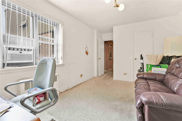 carpeted living room with cooling unit