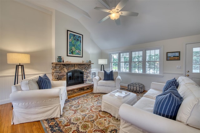 555 Three Waters Ln, Orient, NY 11957 - living area featuring wainscoting, hardwood / wood-style flooring, lofted ceiling, and a wealth of natural light