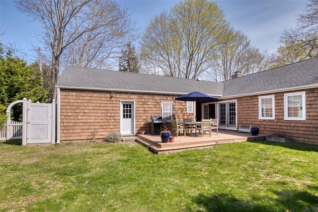 555 Three Waters Ln, Orient, NY 11957 - rear view of property with a wooden deck, a lawn, french doors, and roof with shingles