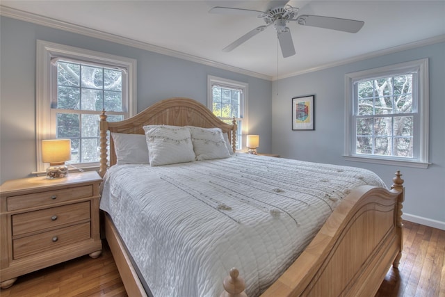 555 Three Waters Ln, Orient, NY 11957 - bedroom with ceiling fan, baseboards, hardwood / wood-style flooring, and ornamental molding
