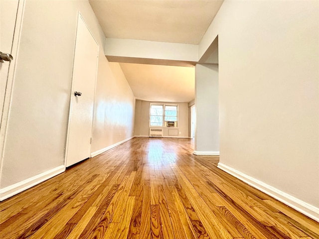 60-11 Broadway Unit 4C, Woodside, NY 11377 - bonus room featuring wood finished floors and baseboards