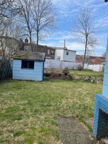 2933 Tenbroeck Ave, Bronx, NY 10469 - view of yard featuring an outbuilding and a storage shed