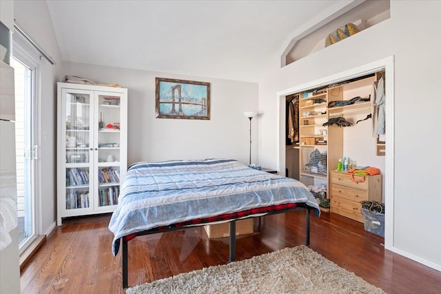31 Arthur St, Baldwin, NY 11510 - bedroom with lofted ceiling, a closet, wood finished floors, and baseboards