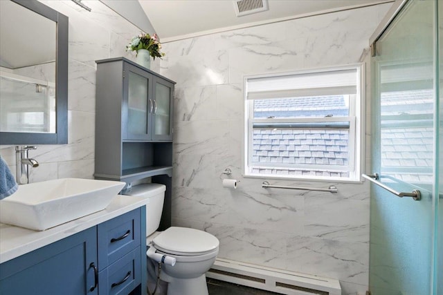 31 Arthur St, Baldwin, NY 11510 - bathroom featuring a shower stall, visible vents, toilet, vanity, and a baseboard heating unit