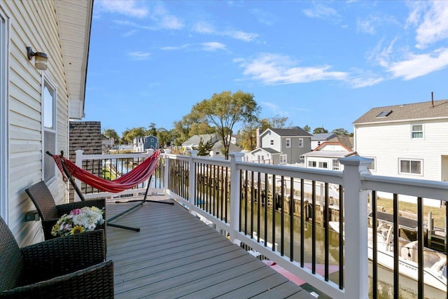 31 Arthur St, Baldwin, NY 11510 - wooden deck featuring a residential view