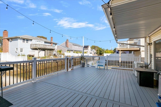 31 Arthur St, Baldwin, NY 11510 - wooden terrace featuring a residential view