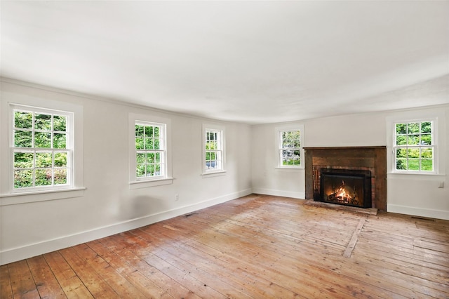 100 E St, South Salem, NY 10590 - unfurnished living room with hardwood / wood-style floors and a brick fireplace