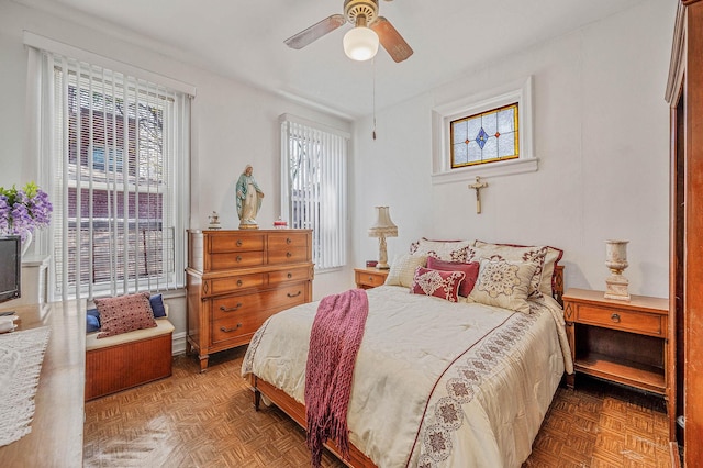bedroom featuring ceiling fan