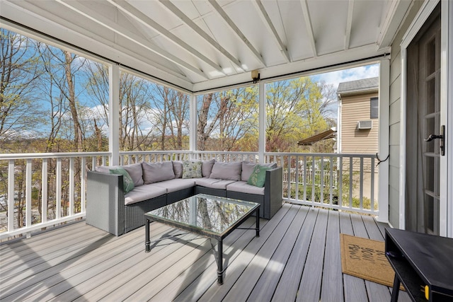 wooden deck with outdoor lounge area